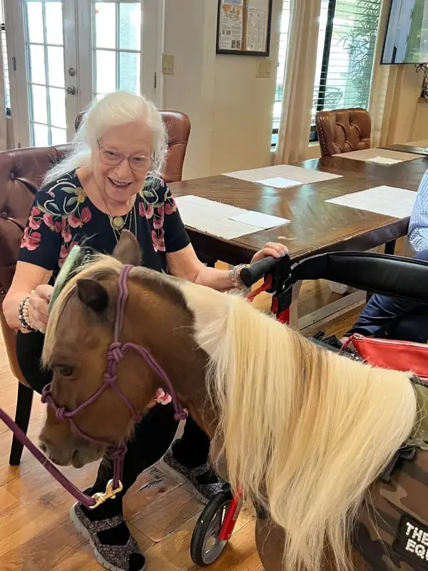 Resident enjoying outdoors at Sweetwater Groves